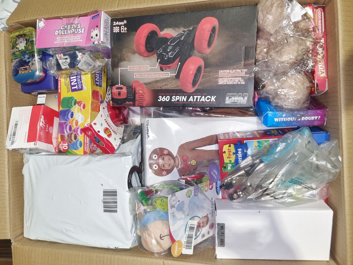 Open StockBee box with a Gabby's Dollhouse microphone, washable paints and a remote-control stunt car
